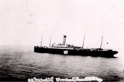 Republic with tarp covering the gash in her side